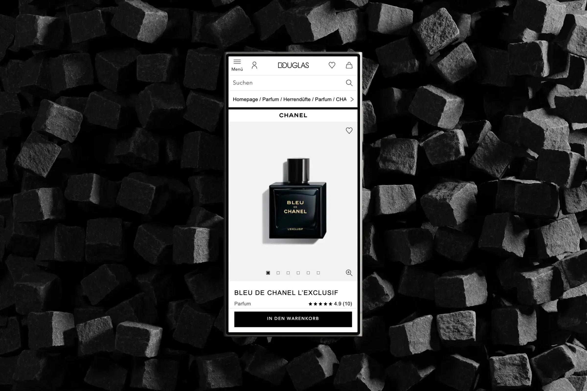 A Douglas product detail page on a phone: a fragrance with its name, rating and an add-to-cart button, on a dark stone background.